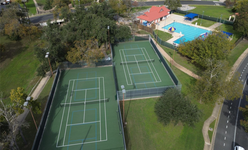 Overhead Shot of one of the Pools and Tennis Court Areas