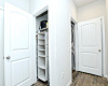 Closet adjacent to washer dryer is conveniently located and can function as coat closet and/or laundry annex to keep laundry supplies, sorting bins, etc.