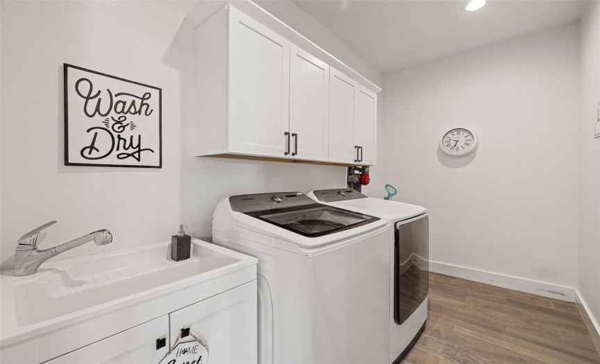 Laundry room with large built-in laundry tub- washer/dryer included!