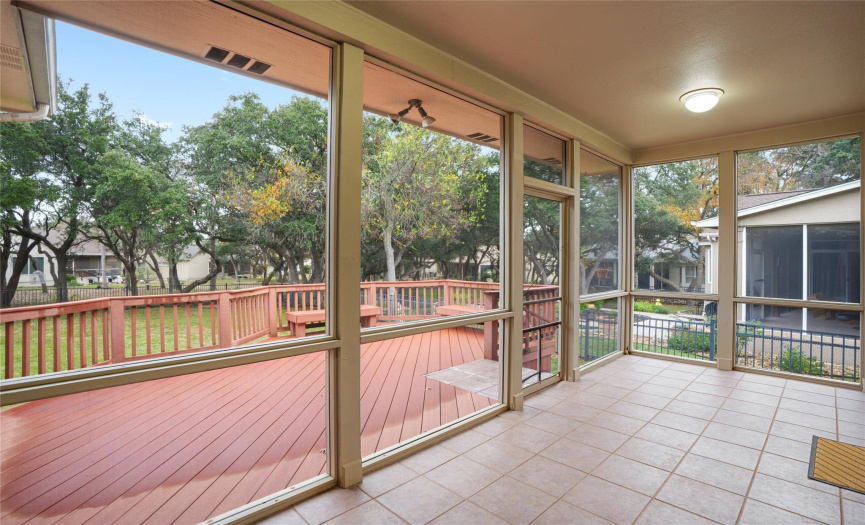 Screened back patio with access directly from living room AND main bedroom.