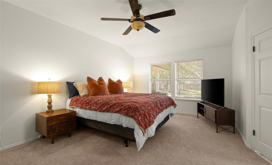 Wake up to a view of the beautiful trees and hear the birds singing in this newly carpeted Master Bedroom.  