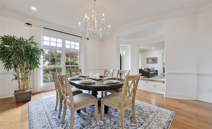Formal dining room is perfect for more upscale occasions with adjacent butler’s pantry. Plus hidden flex space next to formal dining room features fireplace and built-ins.