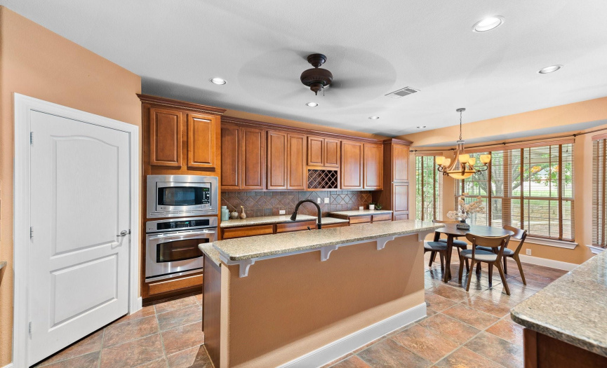 Stainless appliances and two islands in this Cortez model.