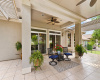 The double sliders open onto this lovely patio with multiple seating/entertainment areas.