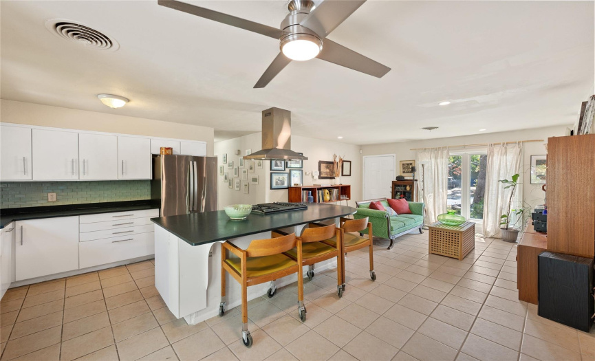 The kitchen has nice space that opens up the 2 family/living areas.