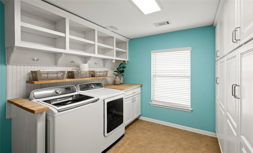 Large laundry room with tons of storage