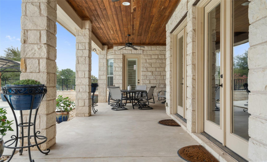 Lounge and entertain on the sprawling covered patio featuring a tongue & groove ceiling.