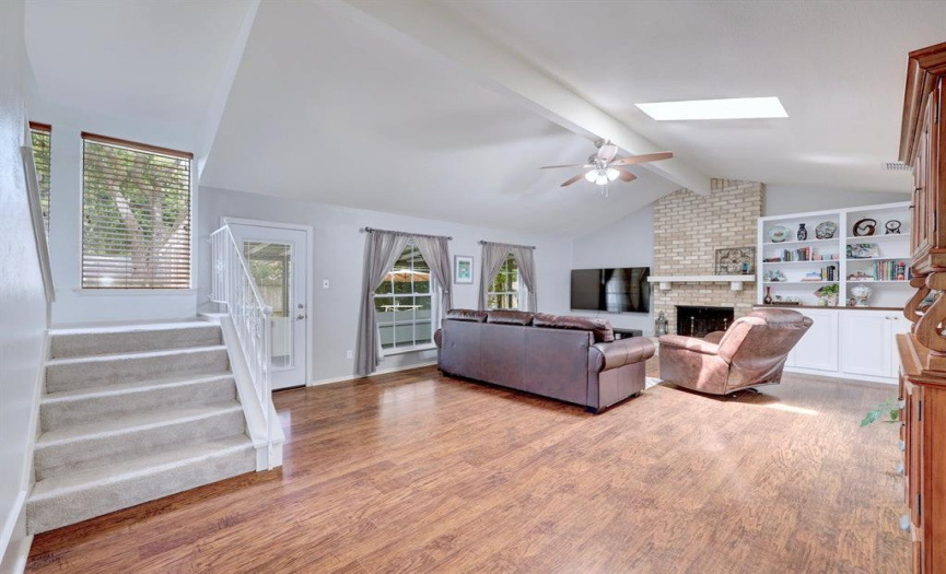 Family room boasts a beautiful vaulted ceiling