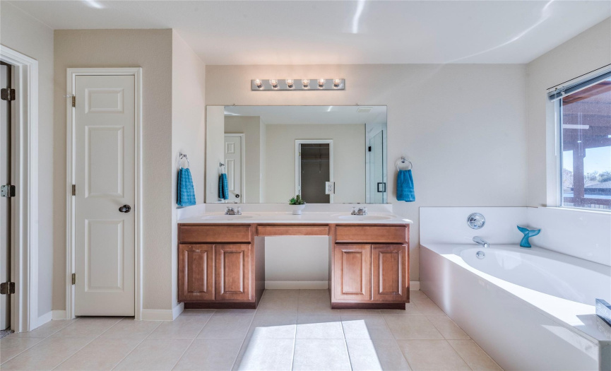 Primary bathroom has separate(new) shower & garden tub plus double vanity. 