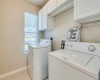 Laundry Room with cabinets.