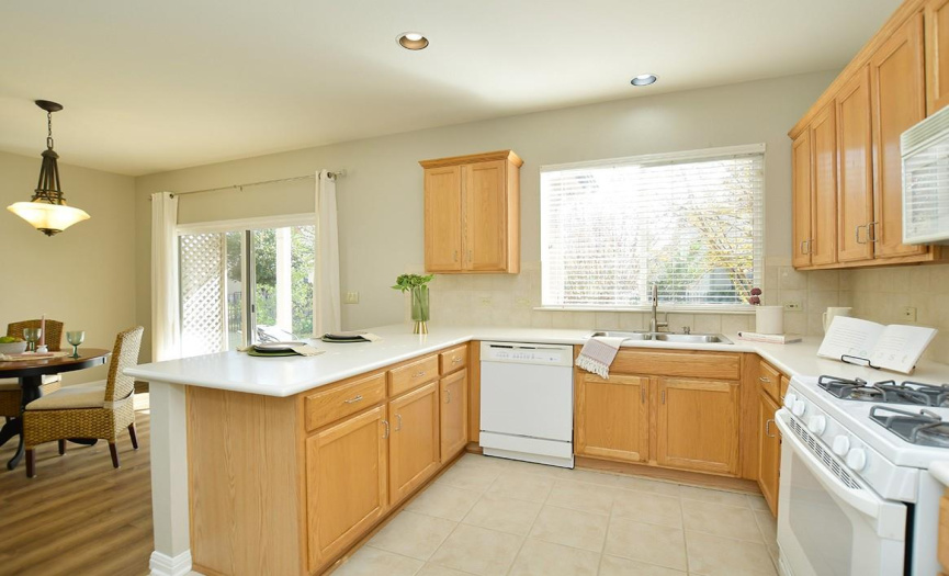 The single level counter top contributes to the open concept feel of the living/dining/kitchen areas.