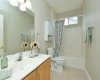 Located mere steps from the guest bedroom is the guest bathroom with its own small window.