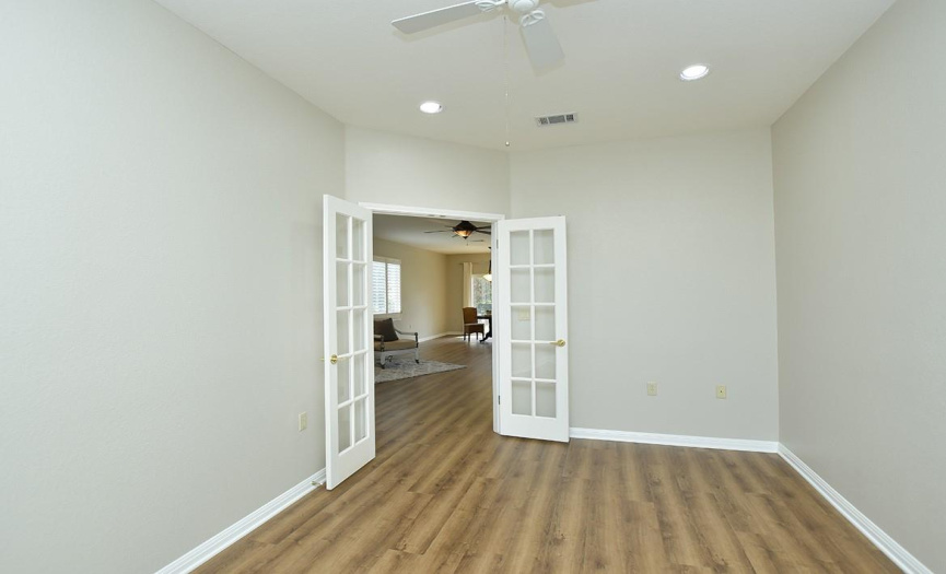 Off the entry area, french doors can be closed for privacy in this generously sized (10' x 15') room - which would make the perfect spot for a study/home office/hobby room or secondary living area.