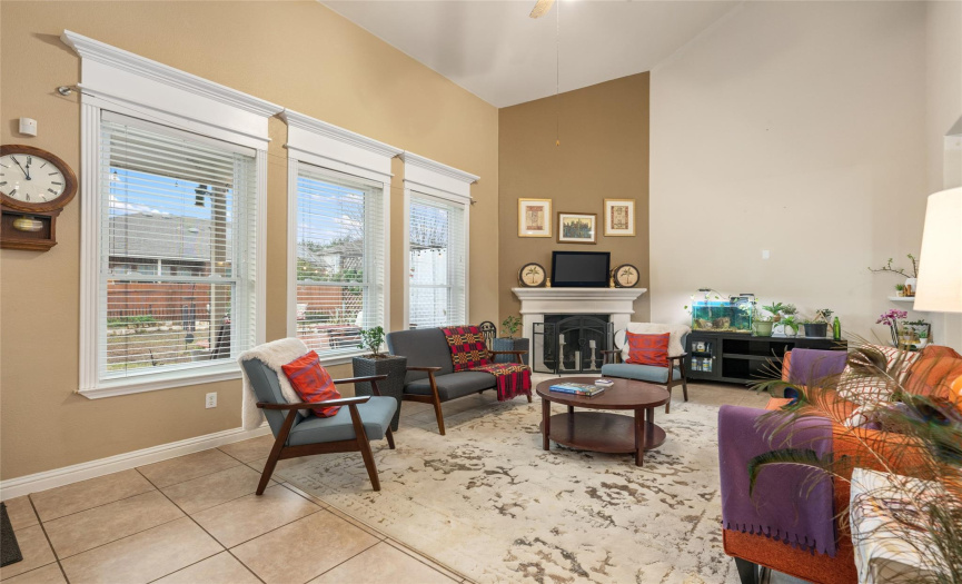 The family room is located on the back of the home and features a gas fireplace, new windows and cathedral ceilings. 