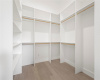 Primary closet with built in shelving
