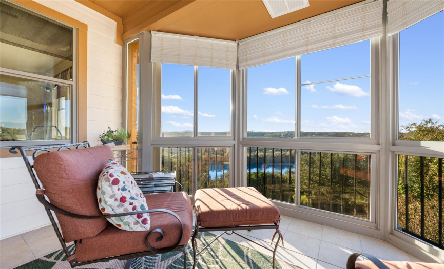 This bonus living spaces was not on the original floor plan and was enclosed by owners (provides additional cooled and heated space). Breathtaking lake and hill country views!