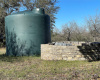Well and water storage tank