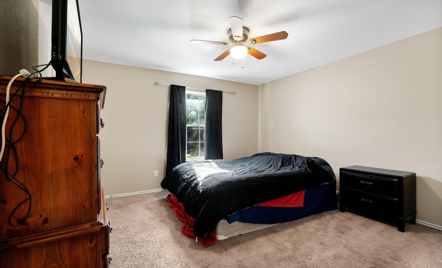 The secondary bedrooms are generously sized.