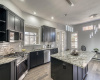 Granite countertops highlight this beautifully designed kitchen.