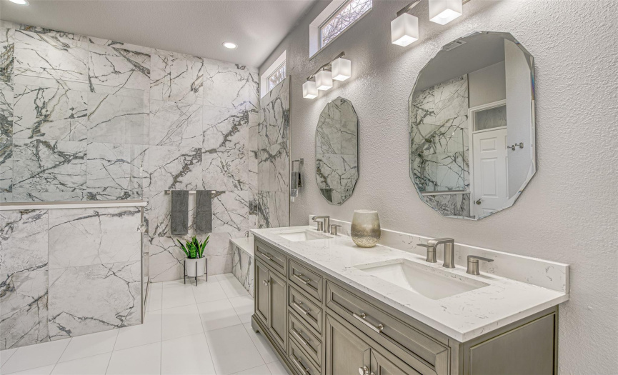 A walk into this glamour shower will start or end your day off right.