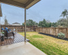 The spacious backyard is a blank slate ready for you to make it your own.