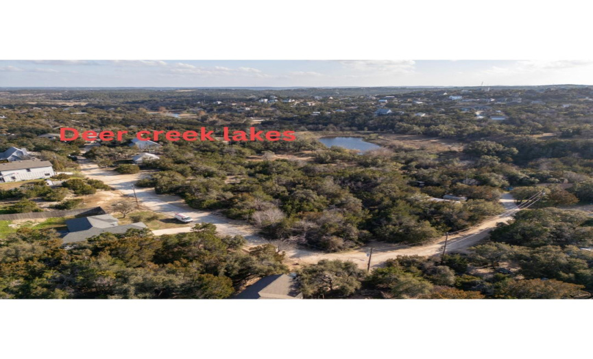 Deer Creek lakes behind lot with trails