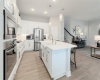 The large kitchen was designed for serious cooking and entertaining with tons of counter space, additional storage, and a generous serving area along with gorgeous finishes, and stainless steel appliances.