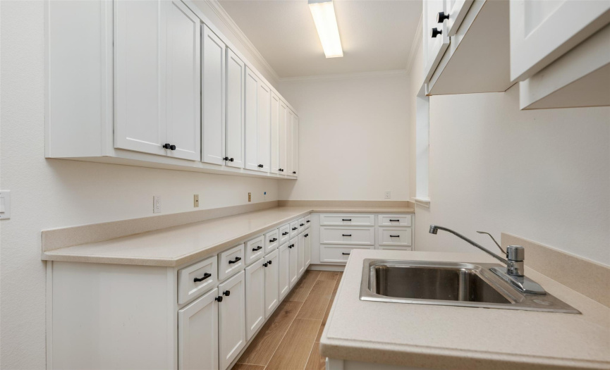More storage in this laundry room/ work space