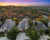 Aerial view at sunset of Lakeway with privacy as no one directly behind the home