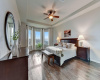 The main floor primary suite serves as a comfortable haven, offering a tray ceiling, tranquil views, and an ensuite bath