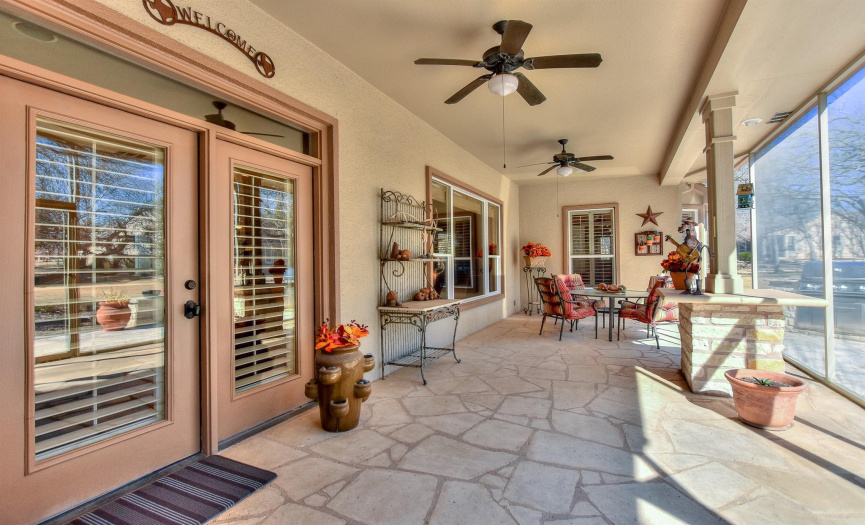Beautiful outdoor living with double ceiling fans