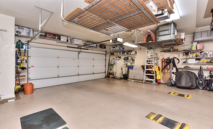 Insulated garage door, ceiling racks