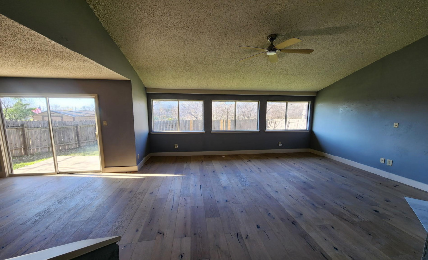 Vaulted ceilings in the living room with new White Oak hardwood floors