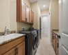 Spacious laundry room with sink