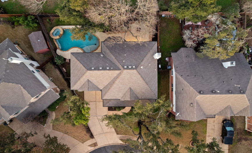 Aerial shot of home showing off that pool!