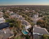 Beautiful aerial of walking trails and home's pool!