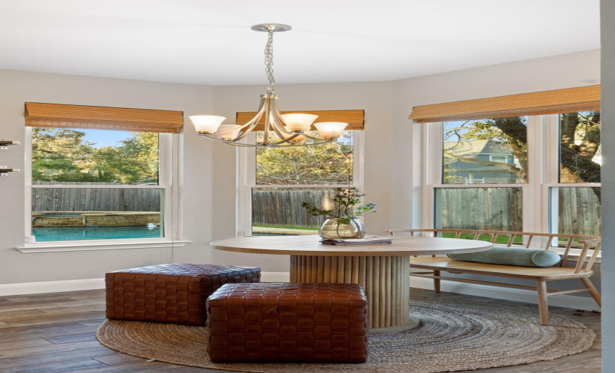 Breakfast nook with tons of light and great views of the pool