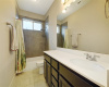 In the extra bathroom, you'll find granite countertops and ample room for getting ready each day.
