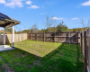 Party time! The large, private backyard can handle a crowd! The covered patio and west-facing orientation create welcome afternoon shade for outdoor living, even in Austin’s hot summers. 