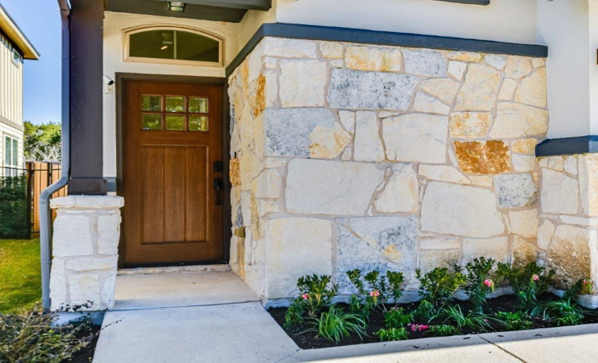 The solid oak Craftsman front door creates an impressive and distinctive welcome.  The security system includes three cameras:  front door, back door, and garage.