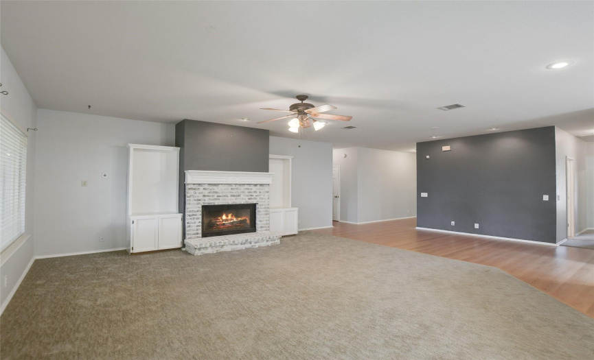 The inviting and spacious family room is perfect for warm evenings by the fire.