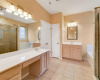 The owner's bath is spacioius and open, with dual sinks and vanities.