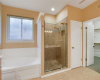The updated spa-like shower completes the owner's bath.