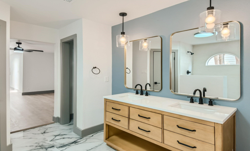Stunning dual vanity and fixtures! You won't want to leave this space in the morning...but for sure the en suite will brighten your day!