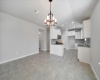 Kitchen opens to dining/living area at 401 Purple Martin