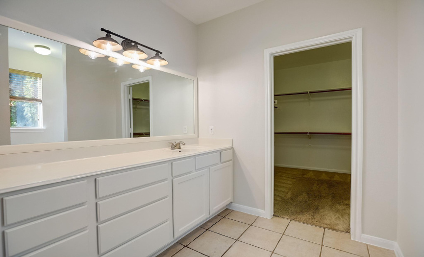 Primary bath ready for your updates! Walk-in shower to the right, no tub. 