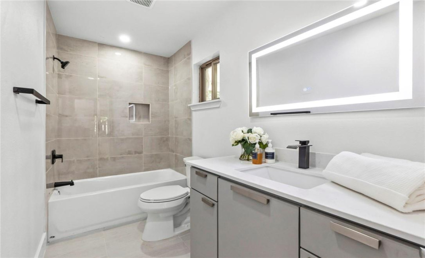 The spacious floor plan also offers another full bathroom