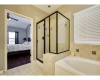 Enjoy a relaxing soaking tub and a separate walk-in shower in the main level owner's suite.