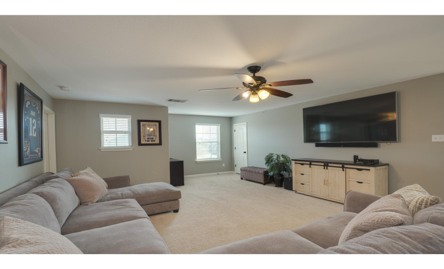 The versatile space is ideal for a secondary living area, a game room, or any creative use that suits your lifestyle.