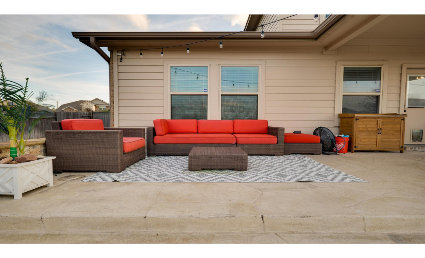 You will love to lounge and soak in the sun in this backyard!